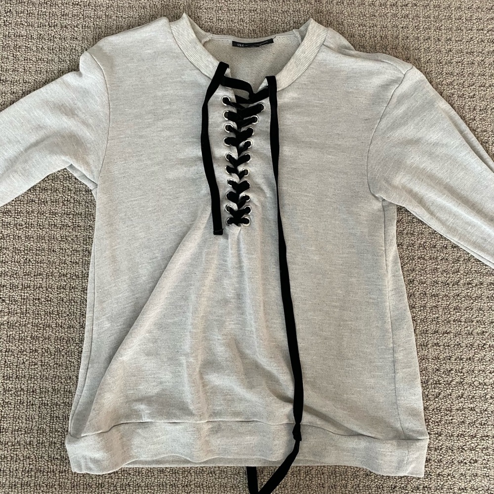 Long sleeve shirt with black lace up